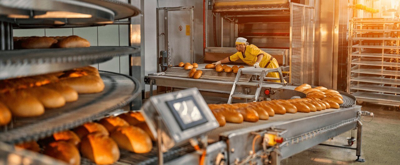 Person working in industrial bakery