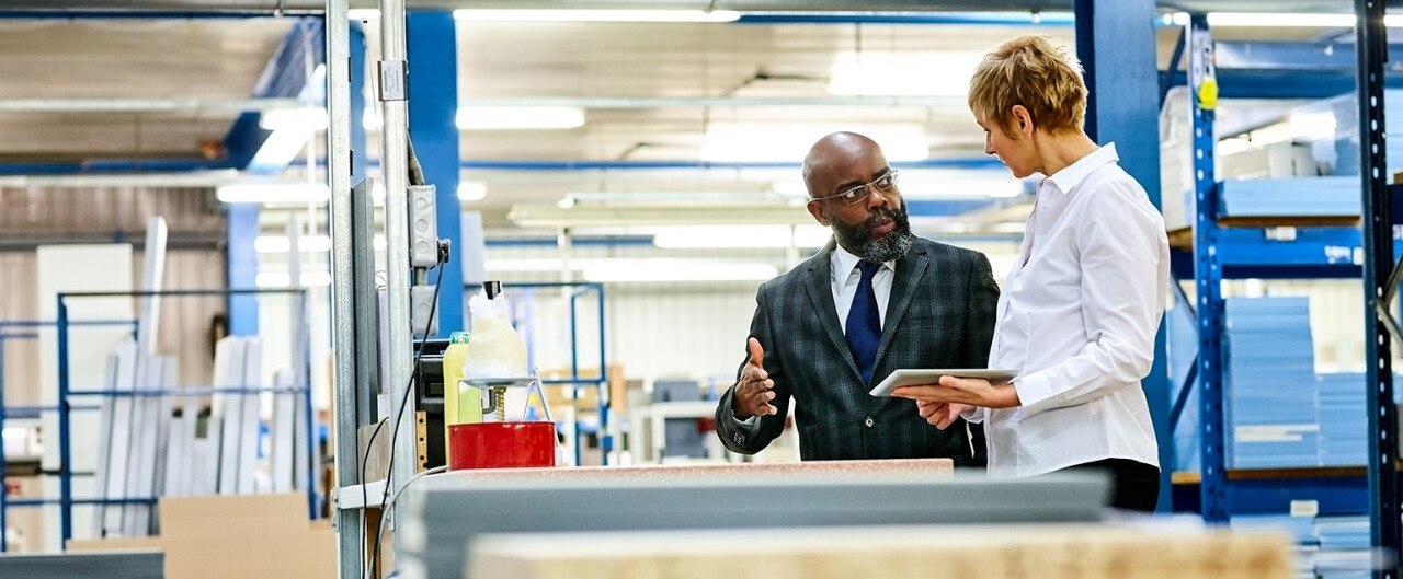 Warehouse owner meeting with banker