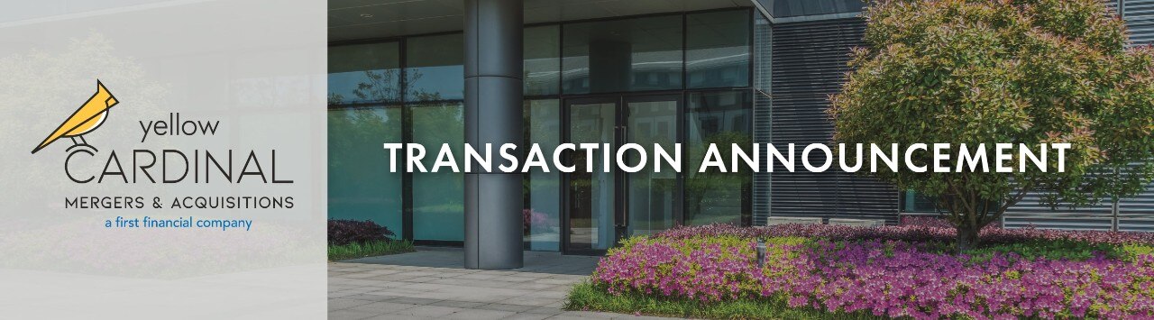 Yellow Cardinal Mergers & Acquisitions logo next to image of landscaped area