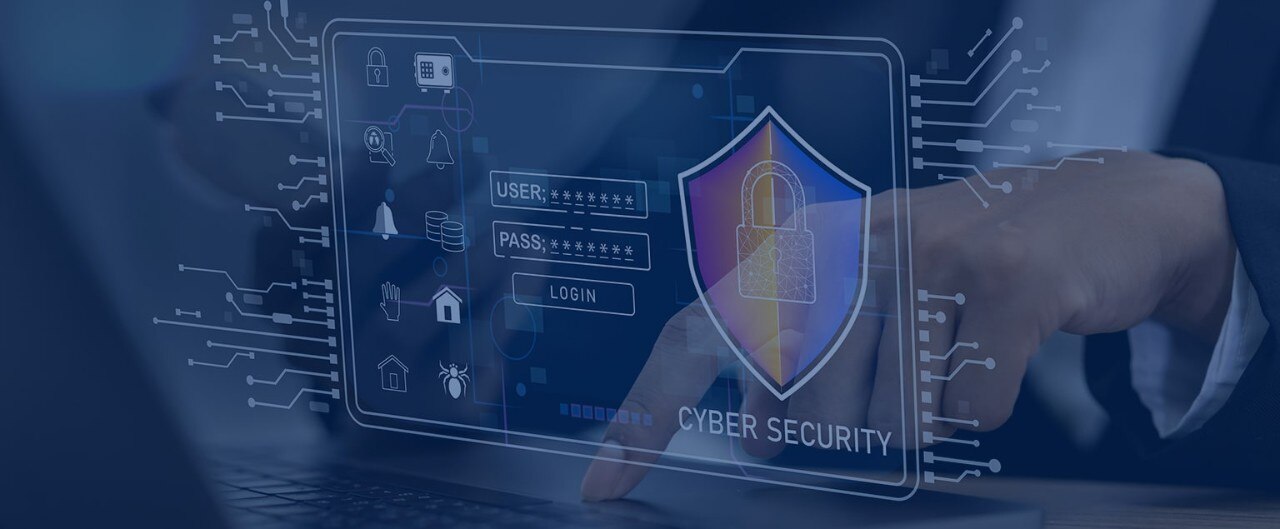 Person typing on computer and encountering a cybersecurity popup