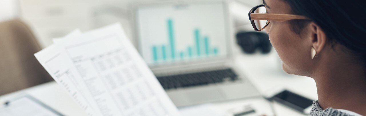 Female business owner reviewing financial documents