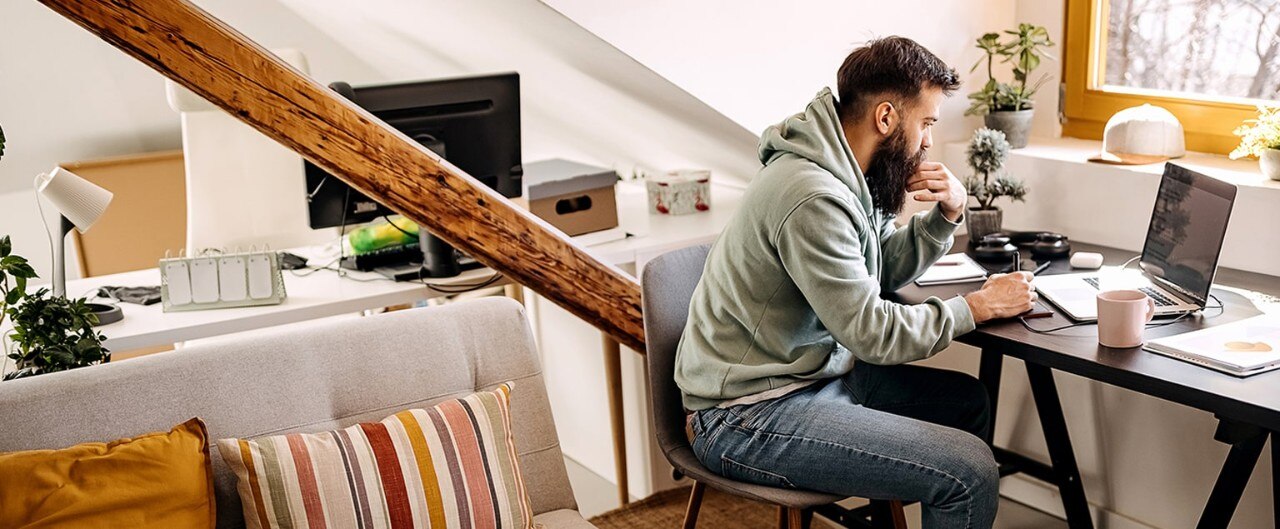 Man working on start-up business at home office