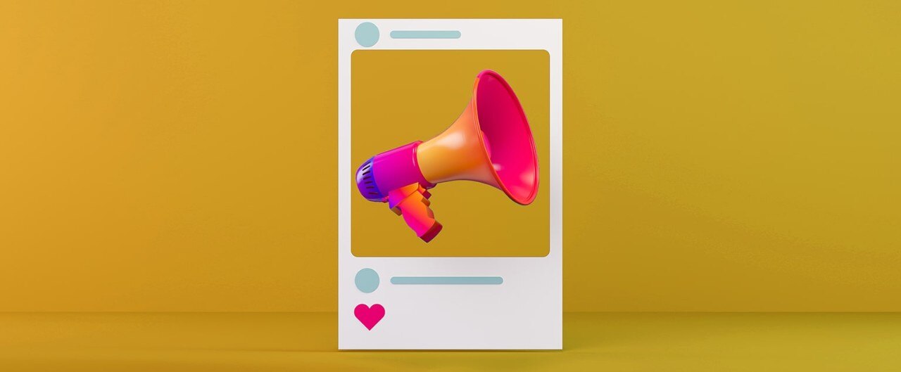 Megaphone in Instagram window on yellow background
