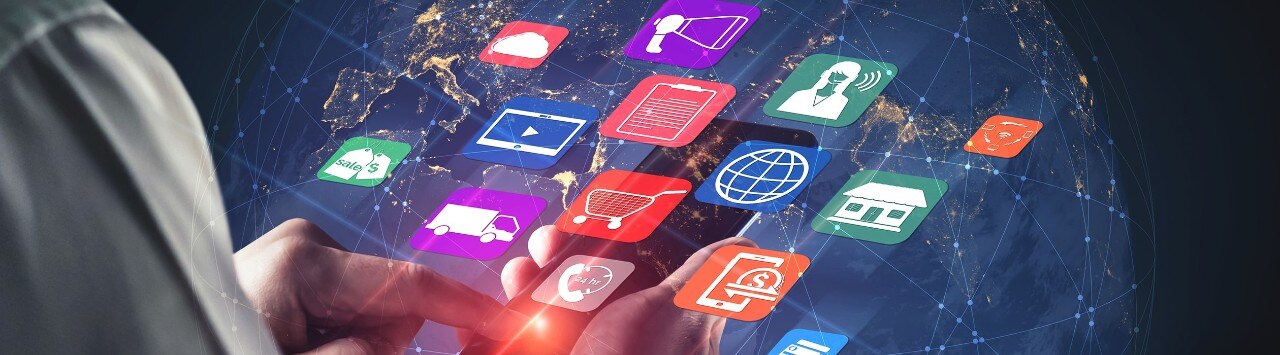 A man holding a phone with digital apps popping out of the screen.