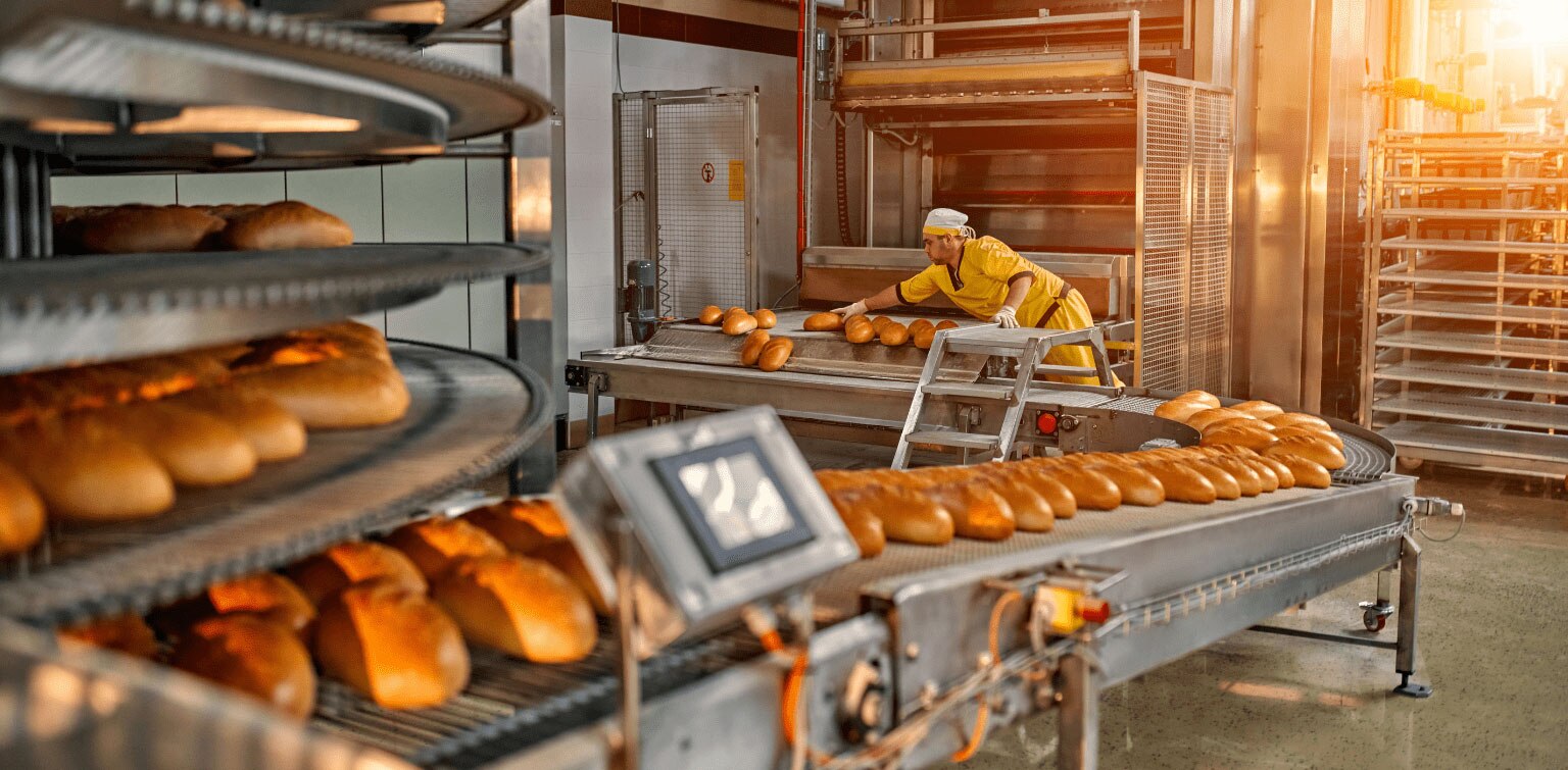 Person working in industrial bakery