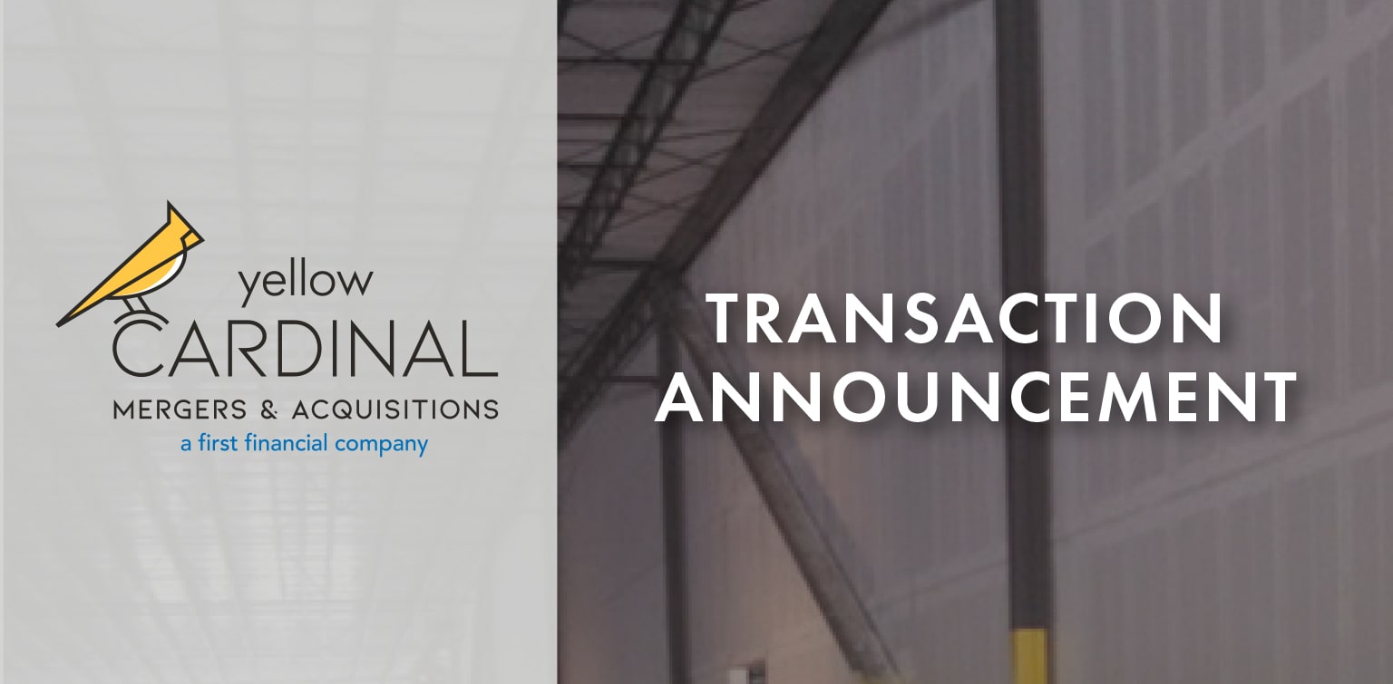 Yellow Cardinal Merger and Acquisitions logo with image off metal framing inside a warehouse and the words "Transaction Announcement"