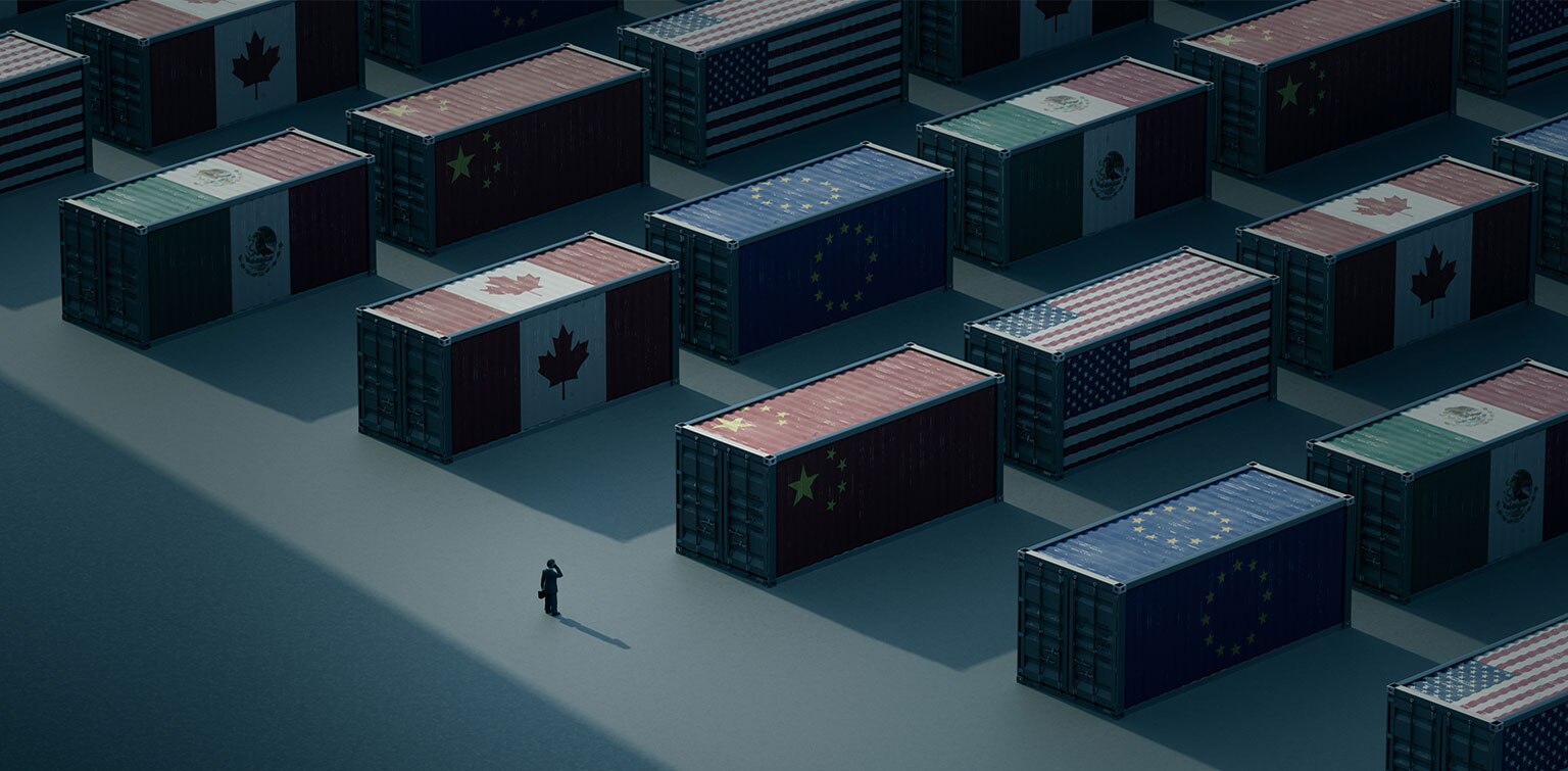 Shipping containers decorated with various countries' flags symbolizing tariffs