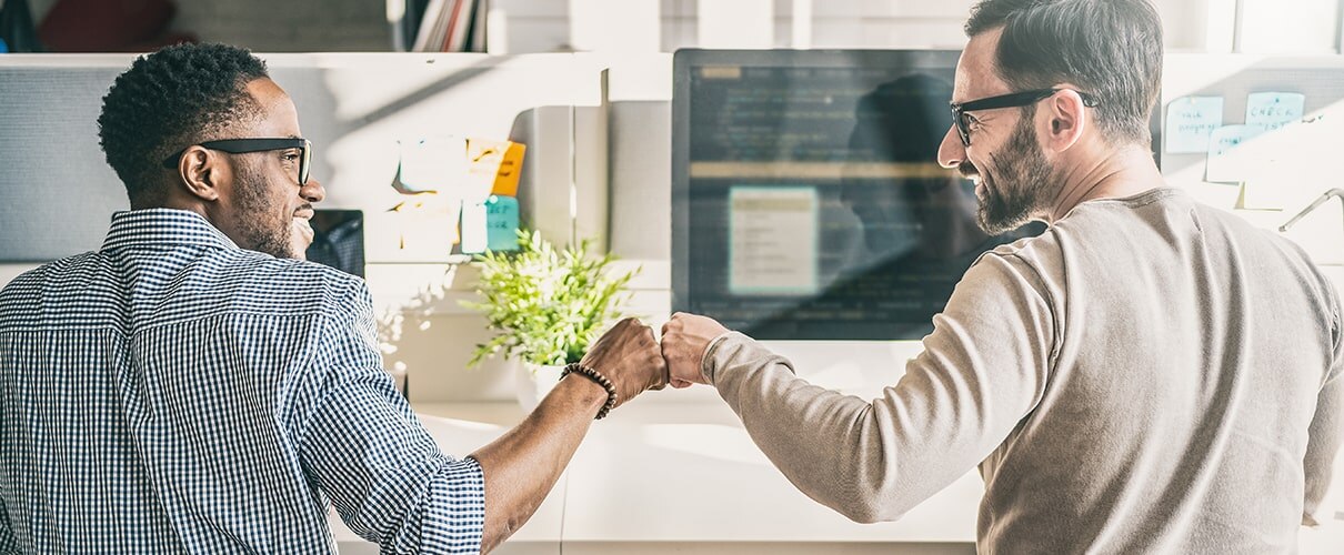 First bump between colleagues at work. 