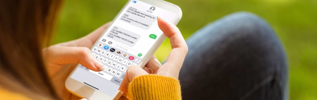 Woman texting on smartphone