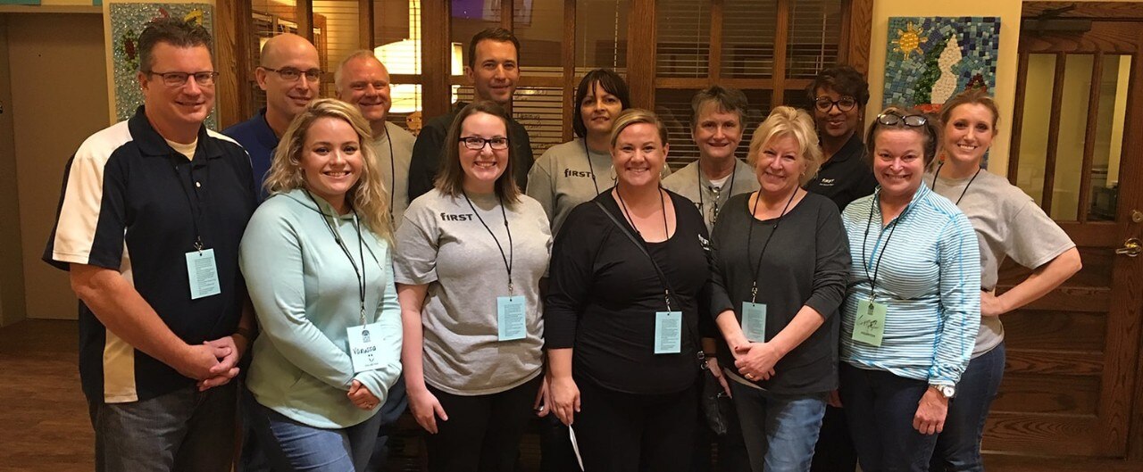 Group of First Financial Bank associates volunteering at Coburn Place