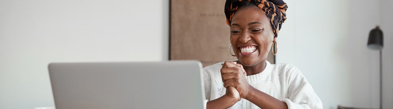 African American female entrepreneur participating in online meeting