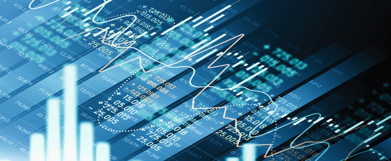 Blue digital stock market chart with financial data, candlestick graphs, and trend lines.