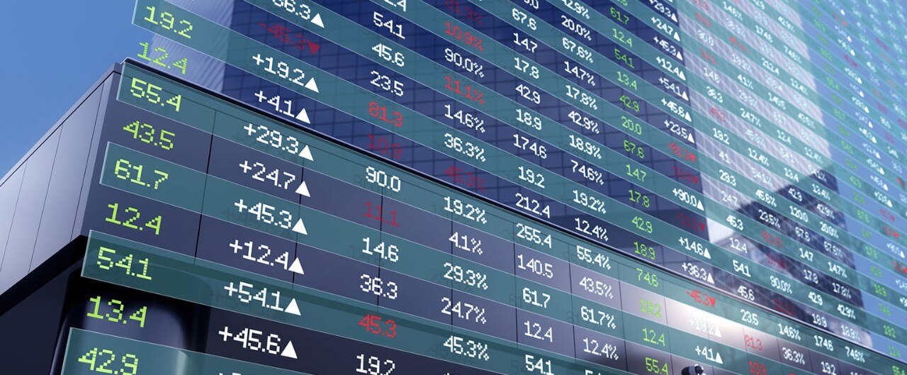 Large digital screen displaying stock prices