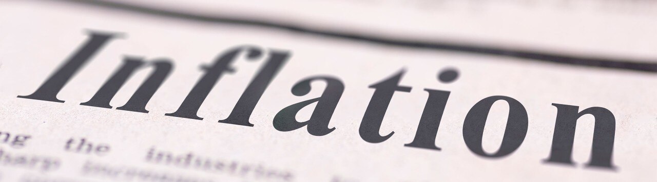 Close up of the word "Inflation" in a newspaper headline