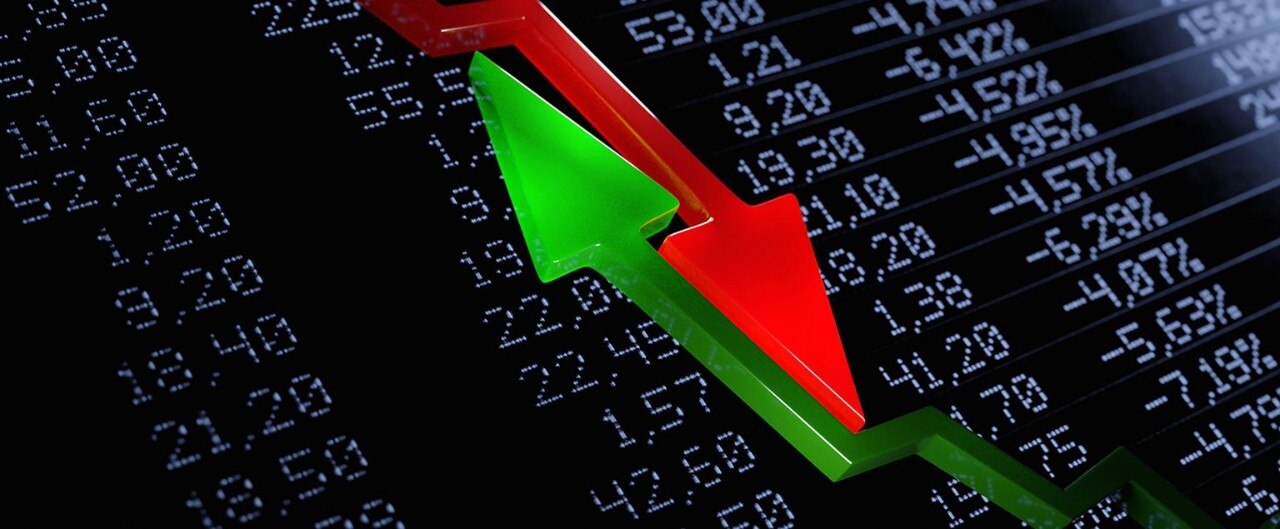 Opposing red and green arrows over financial figures