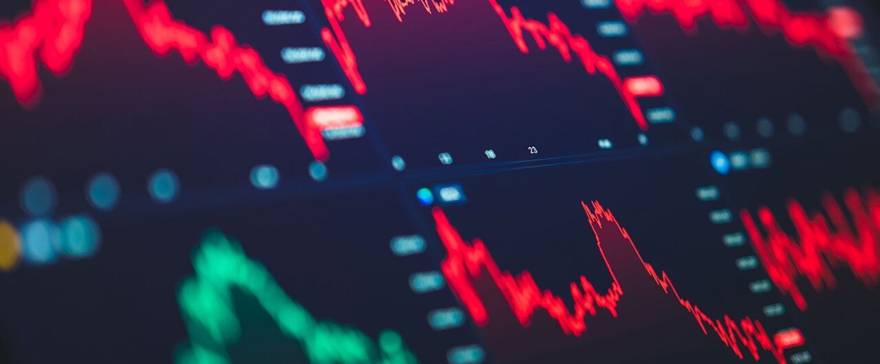 Digital screen displaying tumultuous stock data