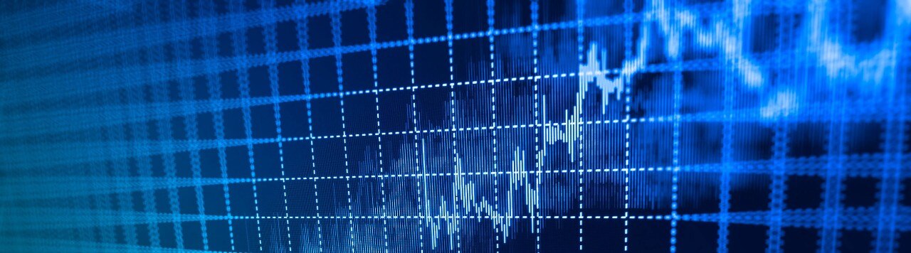 Digital screen displaying upward-trending statistical data