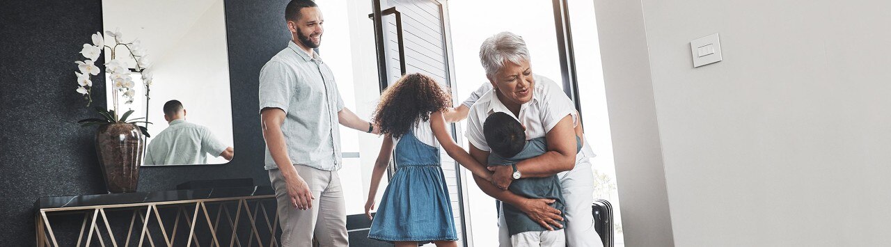 kid hugging adult lady