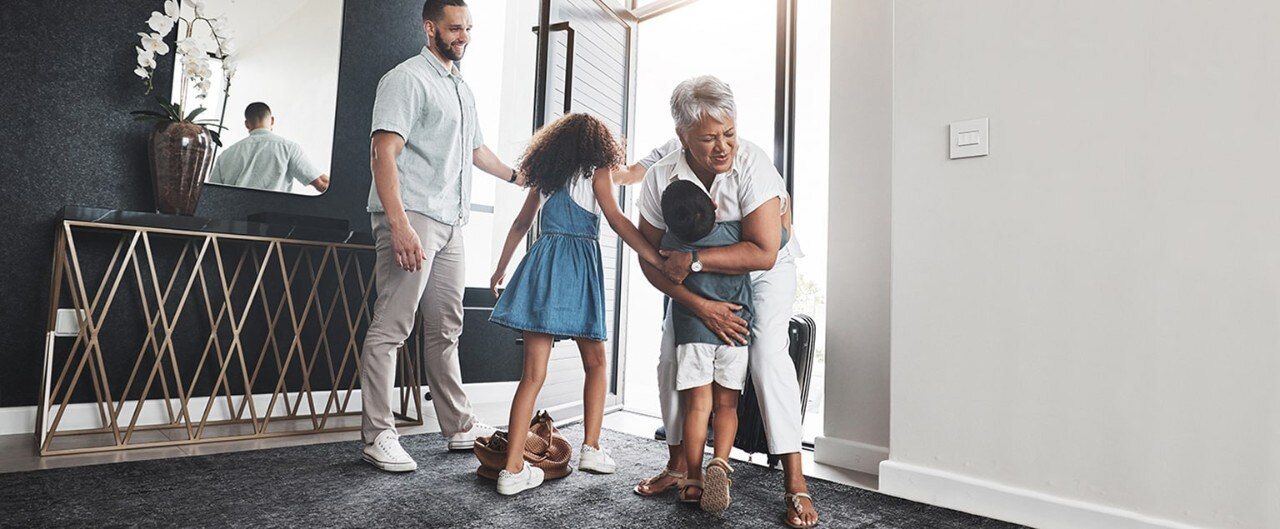 kid hugging adult lady